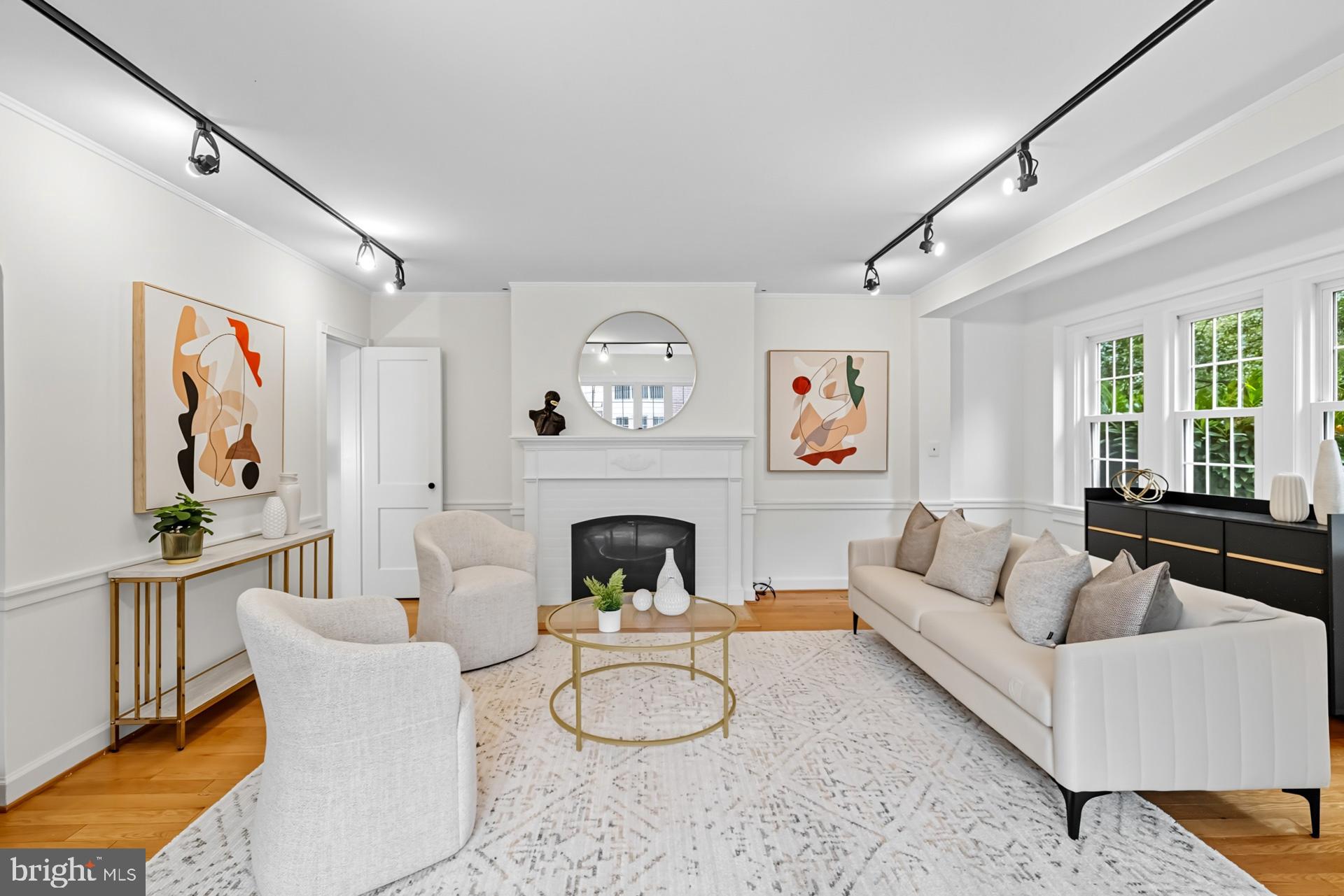 1628 44th Street Northwest Washington, DC 20007 - Photo 6 of 40 a living room with furniture and a fireplace