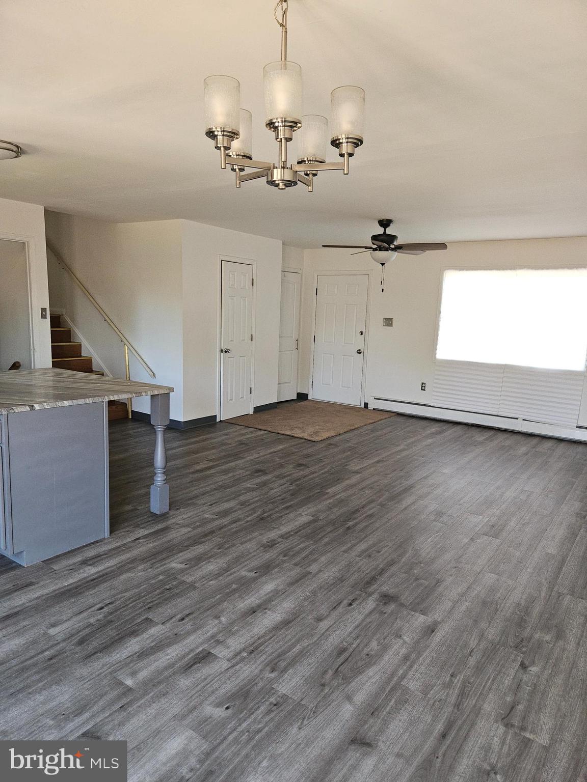 7860 Chambers Hill Road Harrisburg, PA 17111 - Photo 2 of 16 wooden floor in an empty room with a window