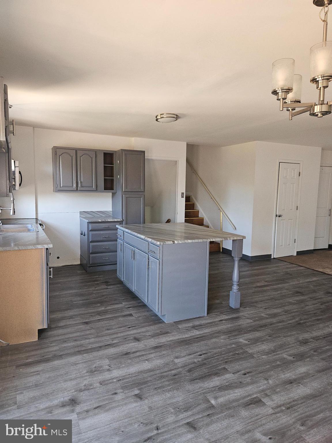 7860 Chambers Hill Road Harrisburg, PA 17111 - Photo 3 of 16 a view of kitchen with sink microwave and cabinets
