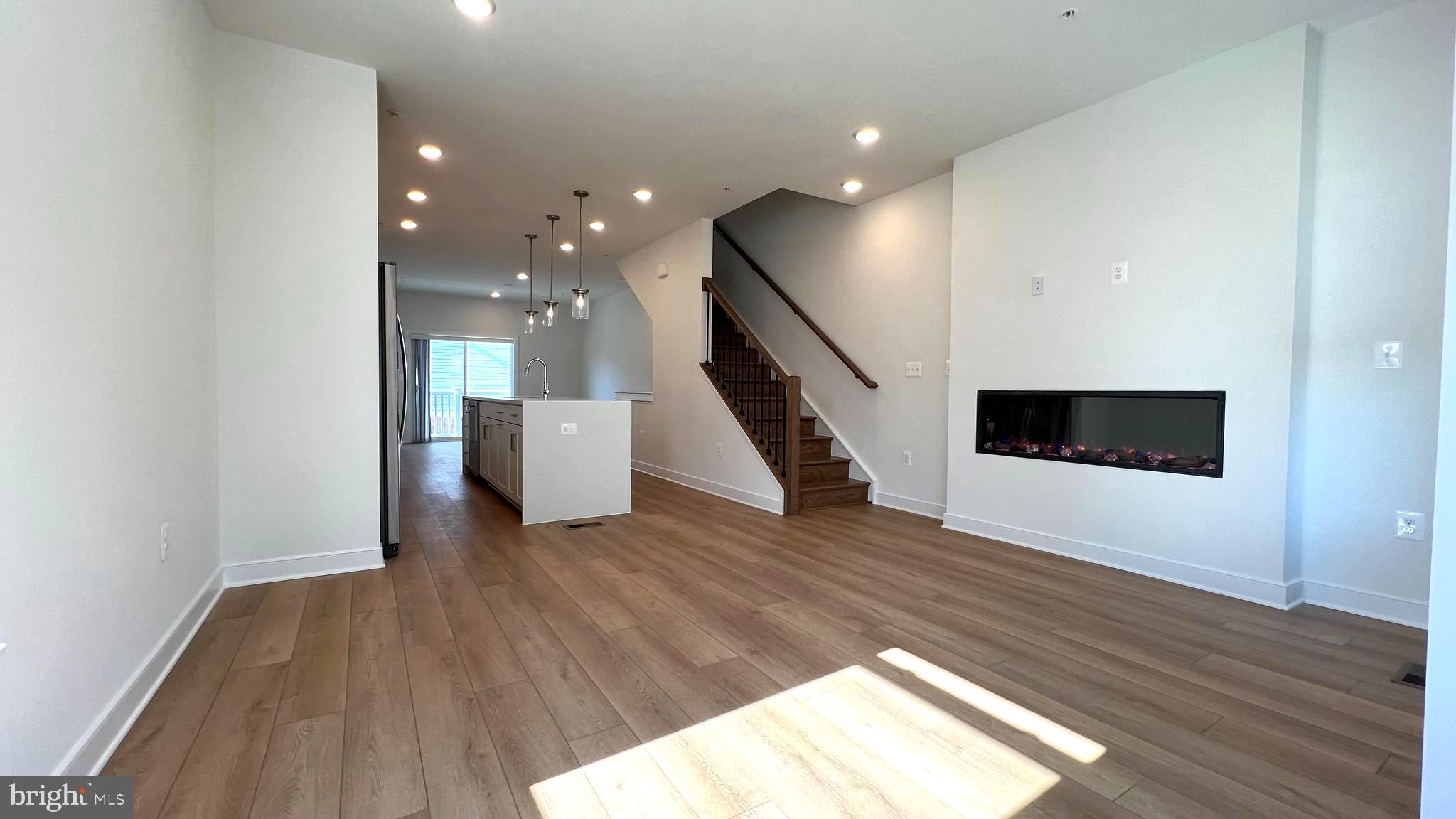 3122 Nina Clarke Drive Gaithersburg, MD 20877 - Photo 11 of 22 a view of entryway and hall with wooden floor