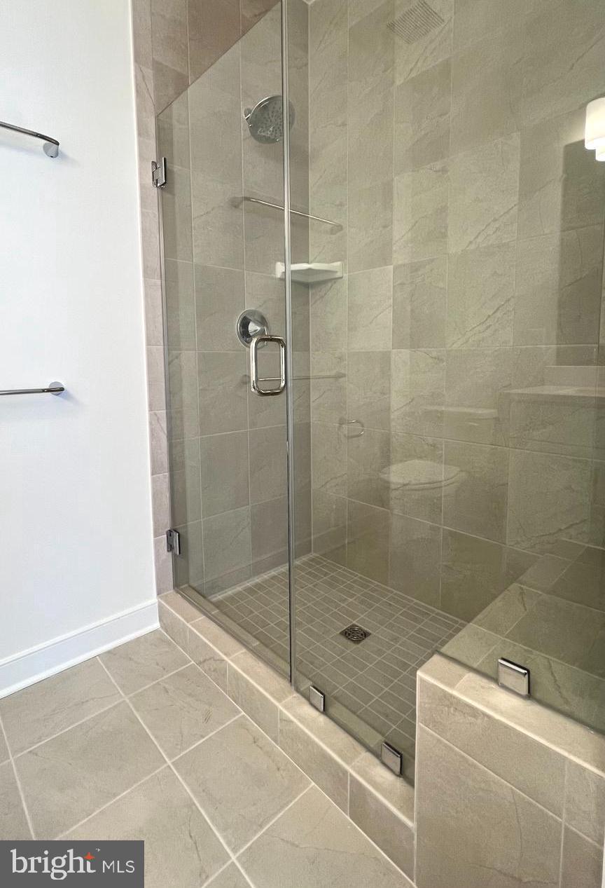 3122 Nina Clarke Drive Gaithersburg, MD 20877 - Photo 17 of 22 a bathroom with a shower