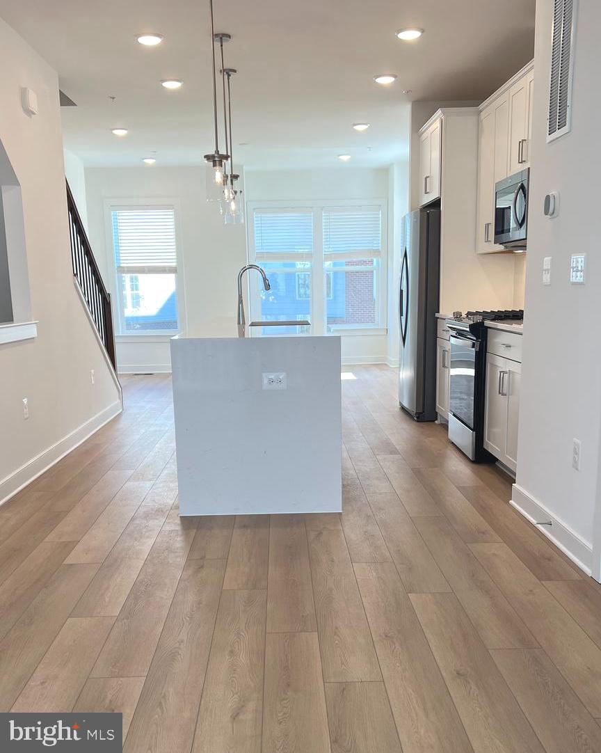 3122 Nina Clarke Drive Gaithersburg, MD 20877 - Photo 4 of 22 a view of kitchen with cabinets and stainless steel appliances