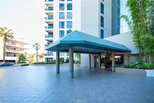 a view of a building with sitting area