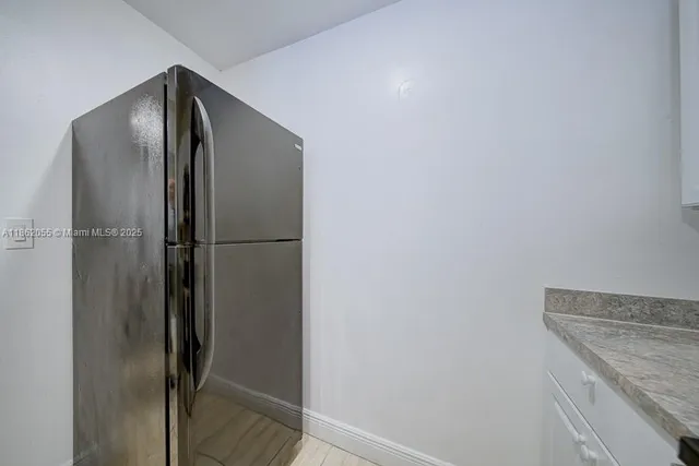 a parked cars parked in front of a building