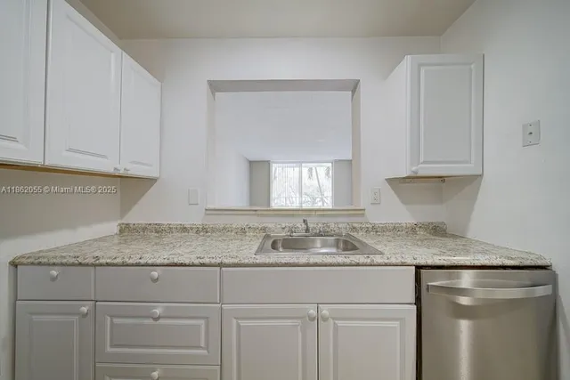 $209,000 | 498 Northwest 165th Street, Unit D206, Miami, FL 33169