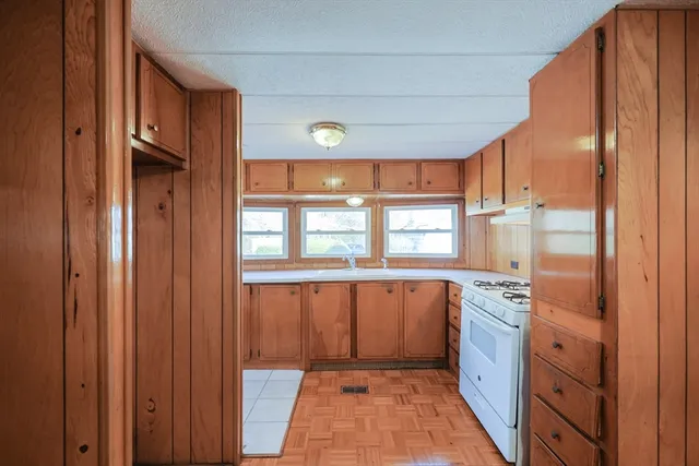 a view of a kitchen with a sink