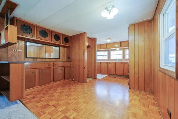 a view of a kitchen with a sink and dishwasher