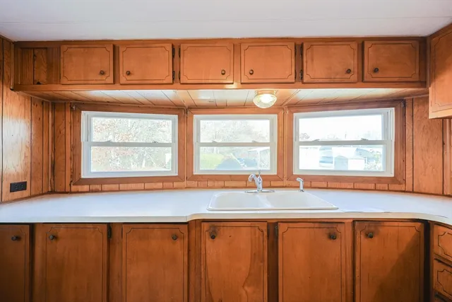 a view of a sink and a window
