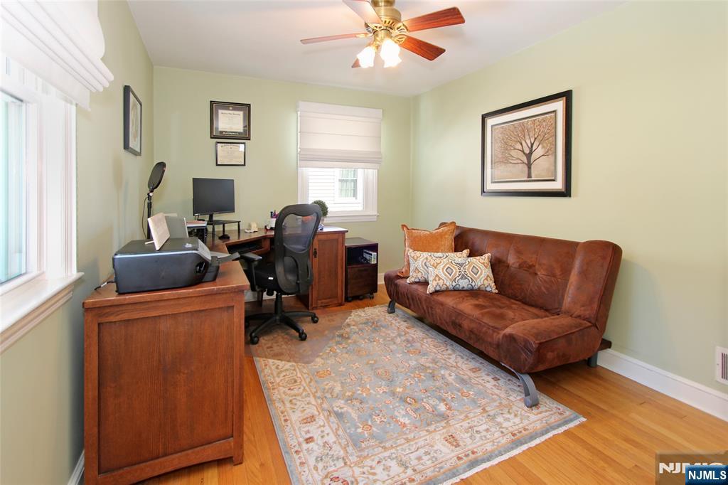 14 Davidson Road Bloomfield, NJ 07003 - Photo 33 of 50 a living room with furniture and a window
