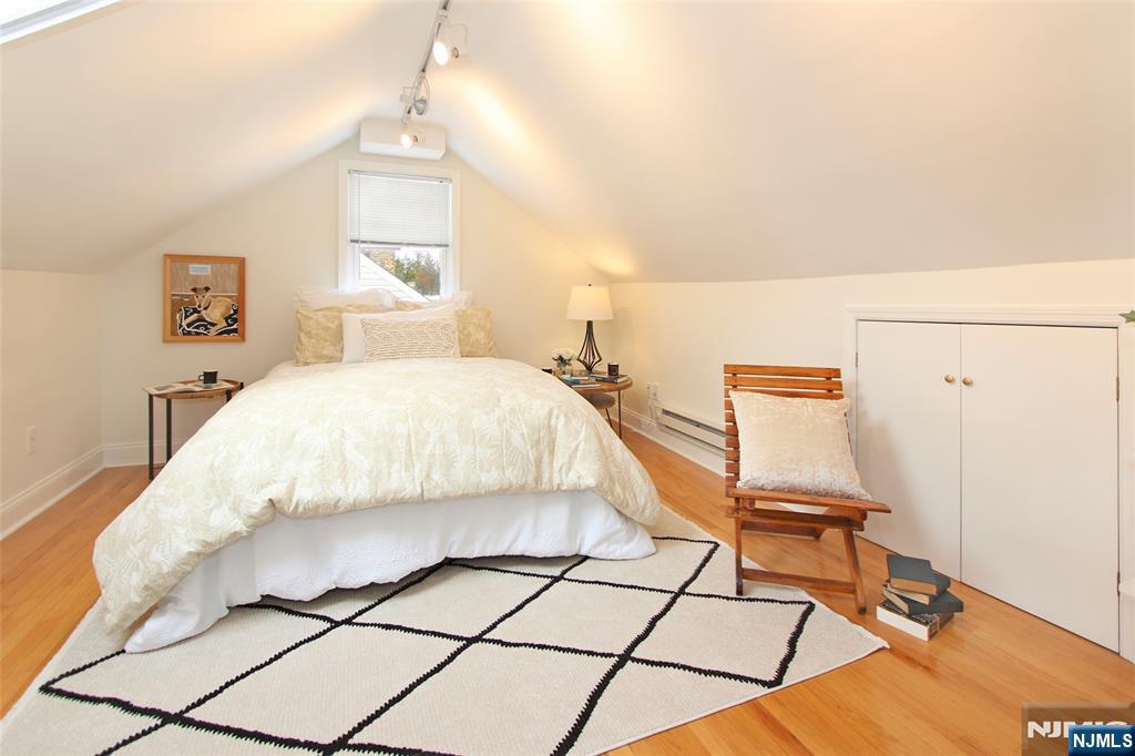 14 Davidson Road Bloomfield, NJ 07003 - Photo 41 of 50 a bedroom with a bed and a window