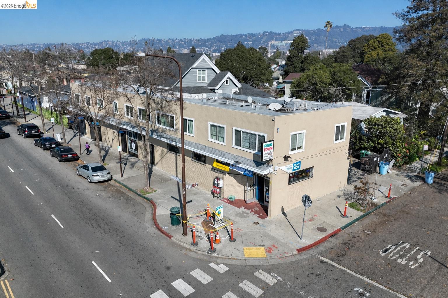 an aerial view of residential houses with outdoor space