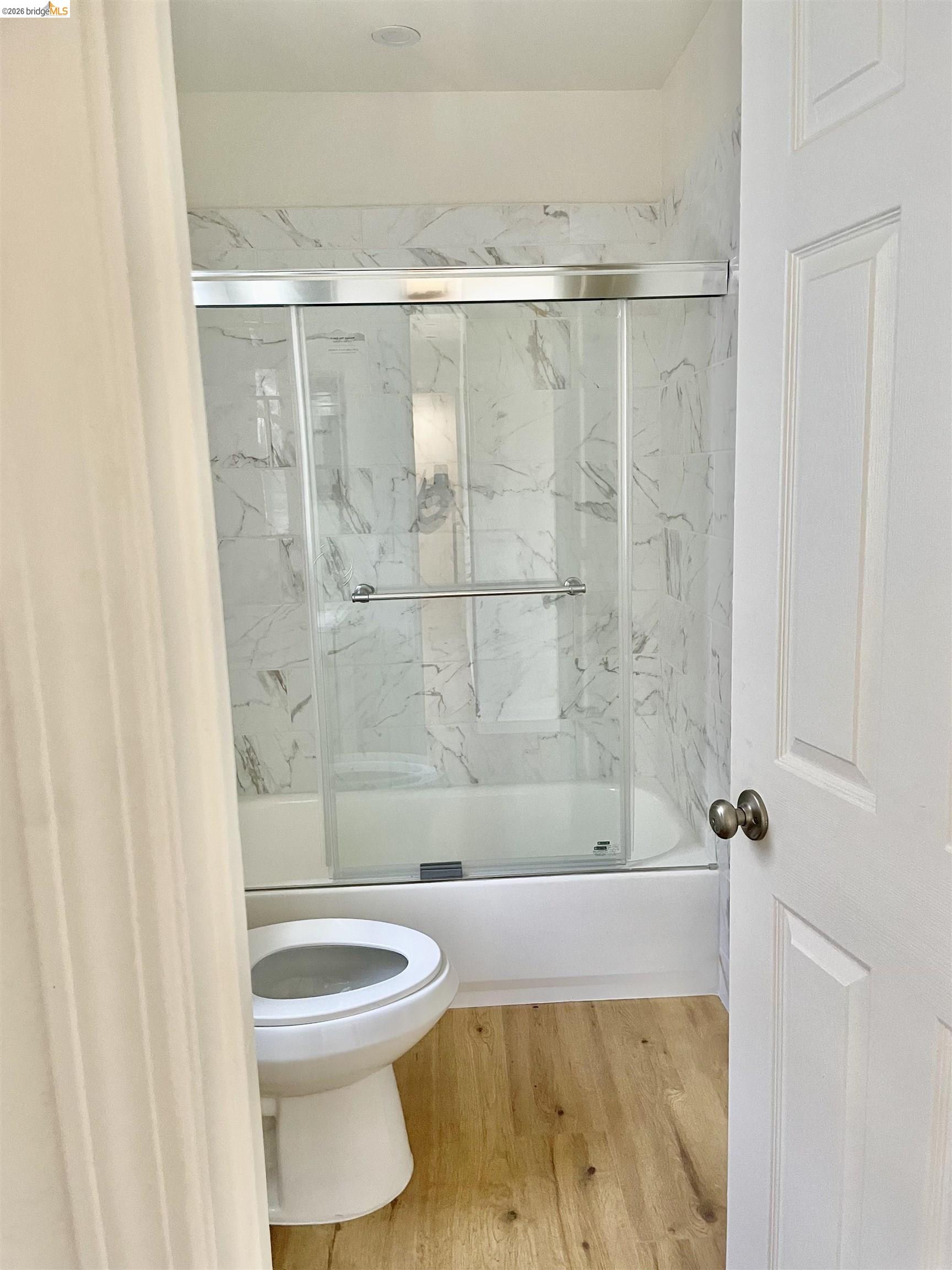 1507 Prince Street Berkeley, CA 94703 - Photo 23 of 30 a bathroom with a shower and a toilet