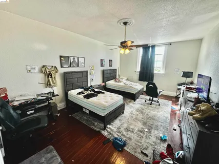 a kitchen with stainless steel appliances a stove a refrigerator and cabinets