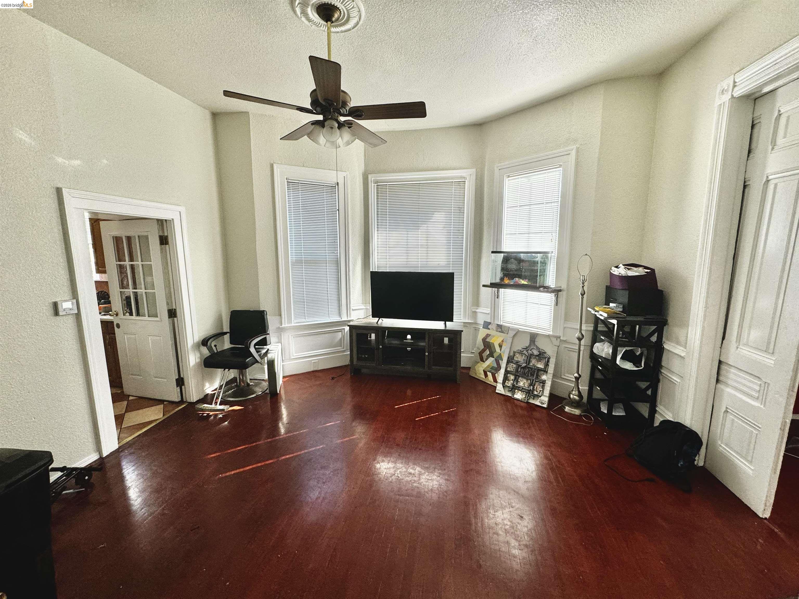 1507 Prince Street Berkeley, CA 94703 - Photo 29 of 30 a living room with furniture and a flat screen tv