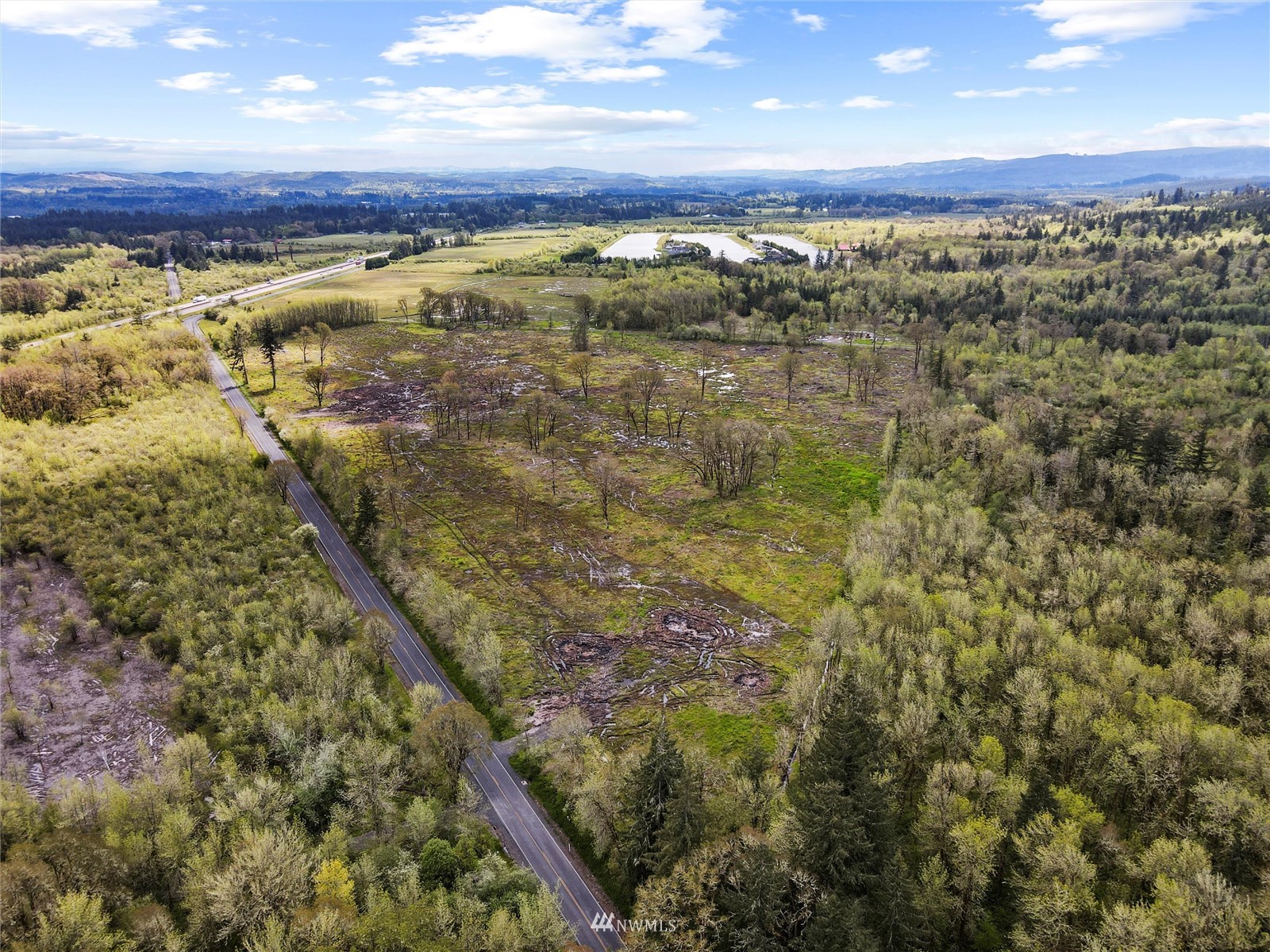5 Knowles Road Winlock, WA 98596 - Photo 13 of 20 a view of a city with an outdoor space