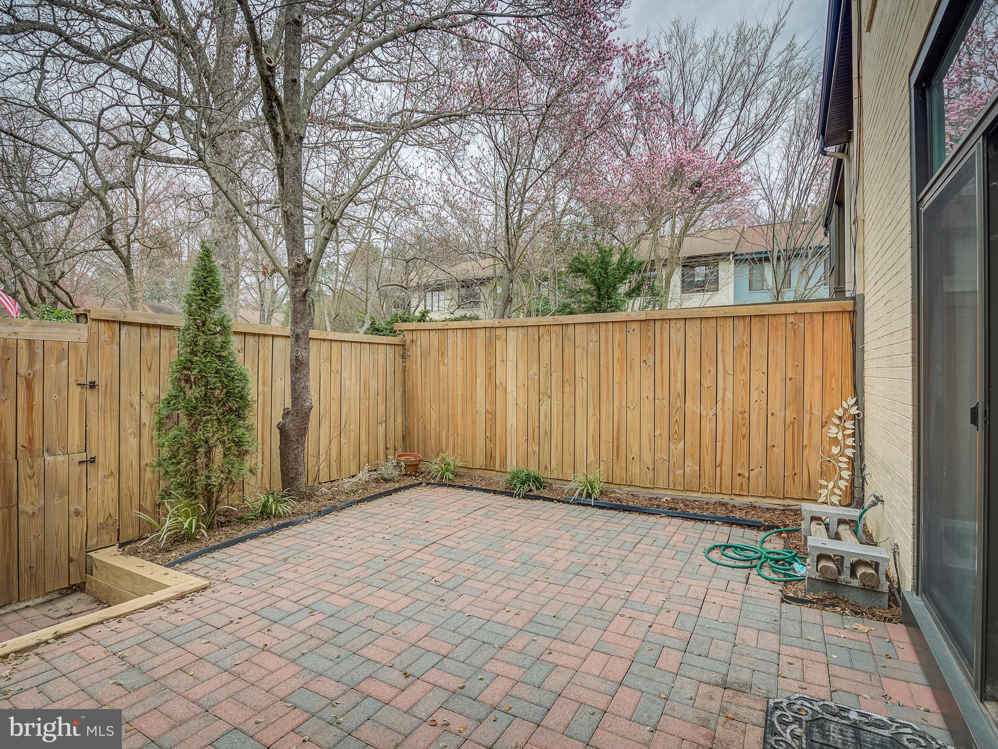 2058 Golf Course Drive Reston, VA 20191 - Photo 15 of 33 Lovely private brick paver patio in fenced yard