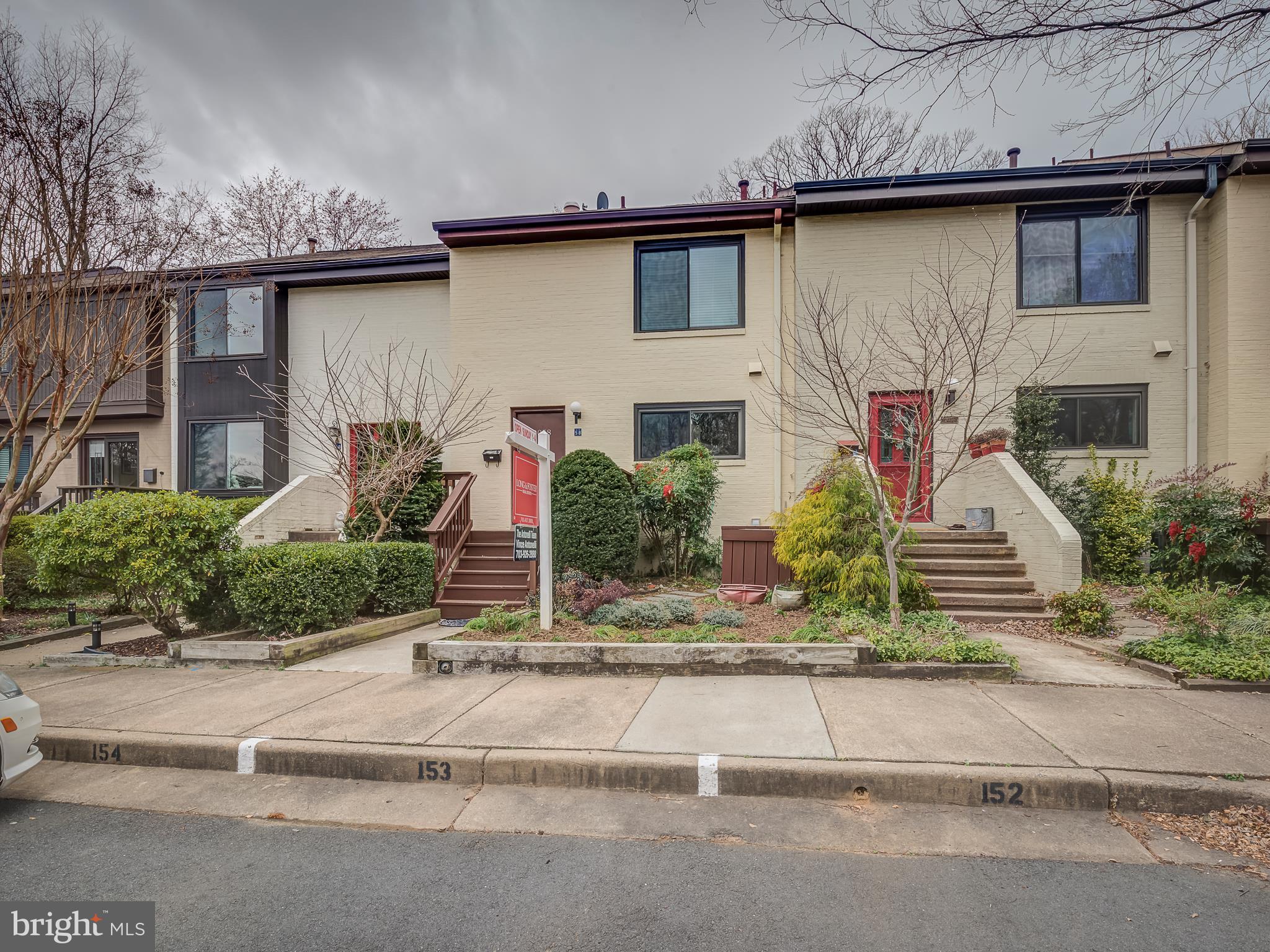 2058 Golf Course Drive Reston, VA 20191 - Photo 3 of 33 Two assigned parking spaces in front of home