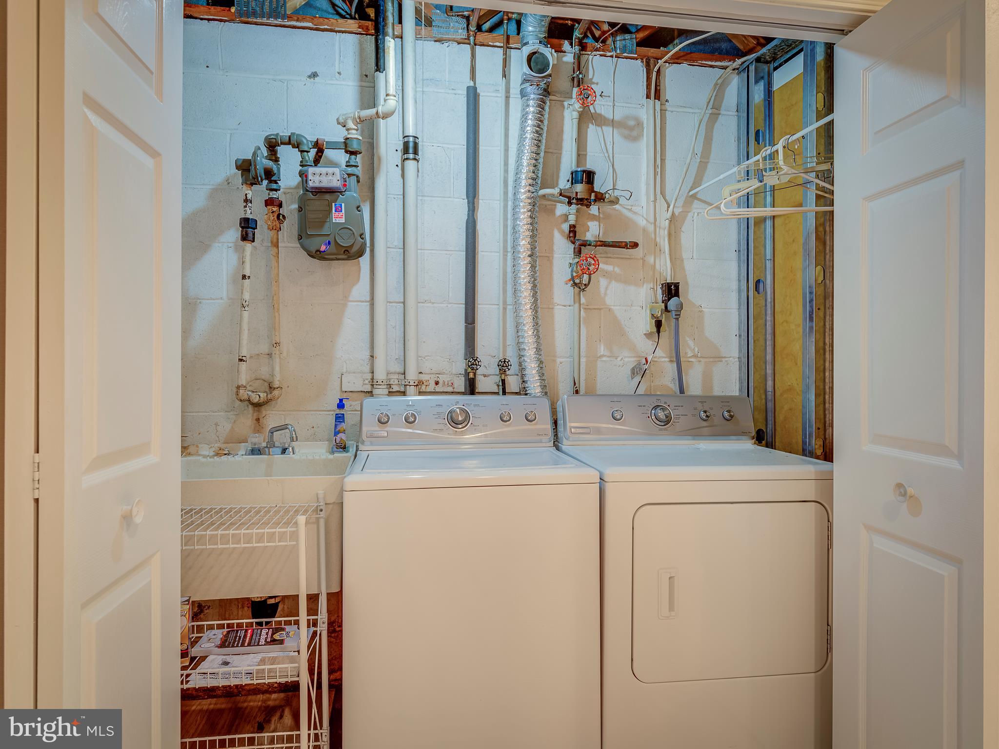 2058 Golf Course Drive Reston, VA 20191 - Photo 29 of 33 Washer and dryer convey