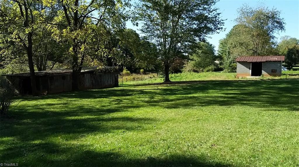 741 North Franklin Road Mount Airy, NC 27030 - Photo 11 of 12 Back Yard with Outbuildings