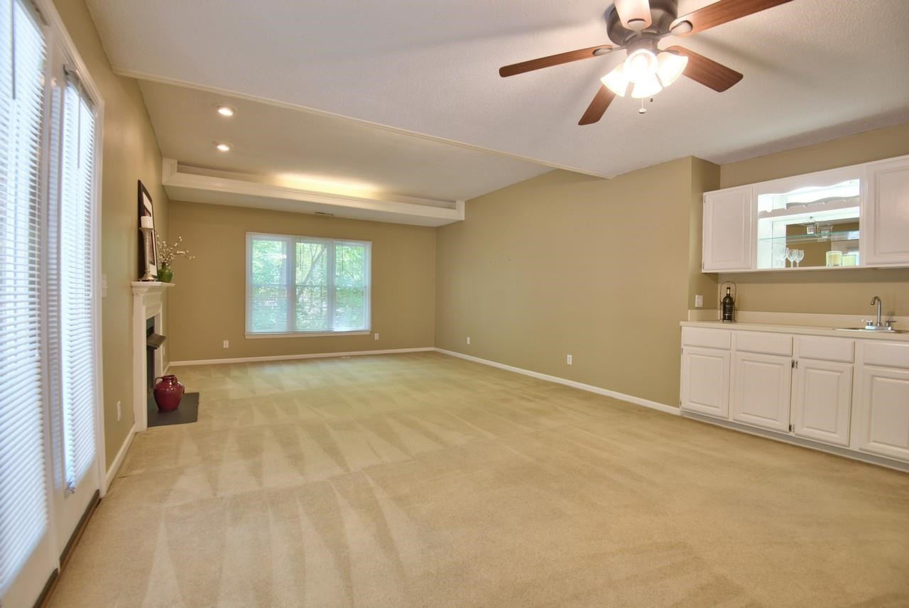 3219 Coachman's Way Durham, NC 27705 - Photo 18 of 33 a view of an empty room with window and cabinet