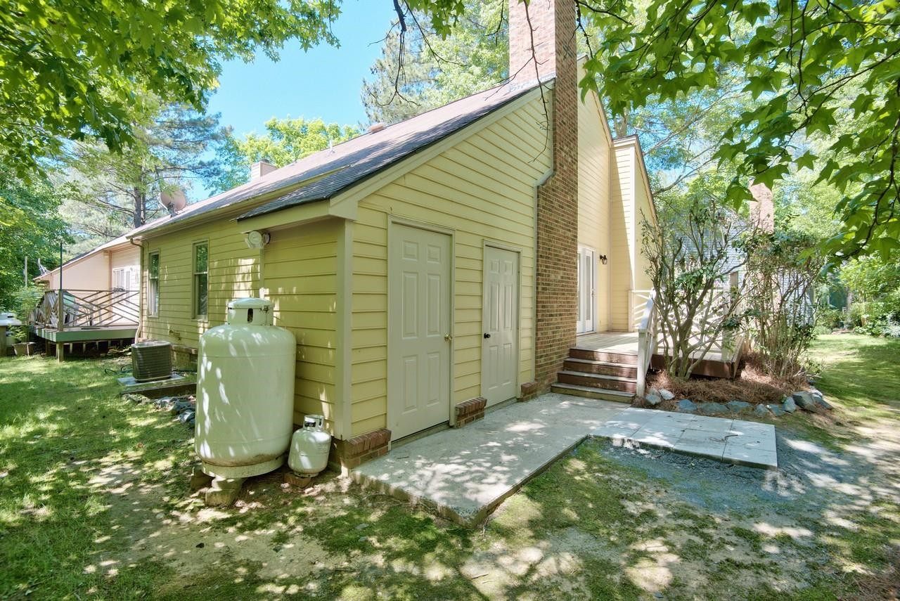 3219 Coachman's Way Durham, NC 27705 - Photo 6 of 33 a view of a back yard of the house