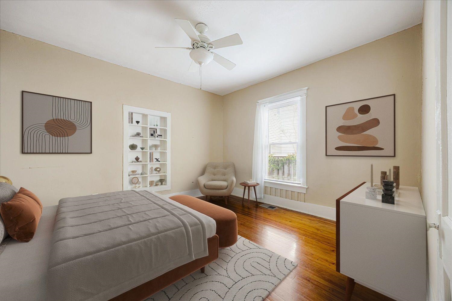 133 South Fenwick Road Memphis, TN 38111 - Photo 11 of 21 a bedroom with a bed and wooden floor