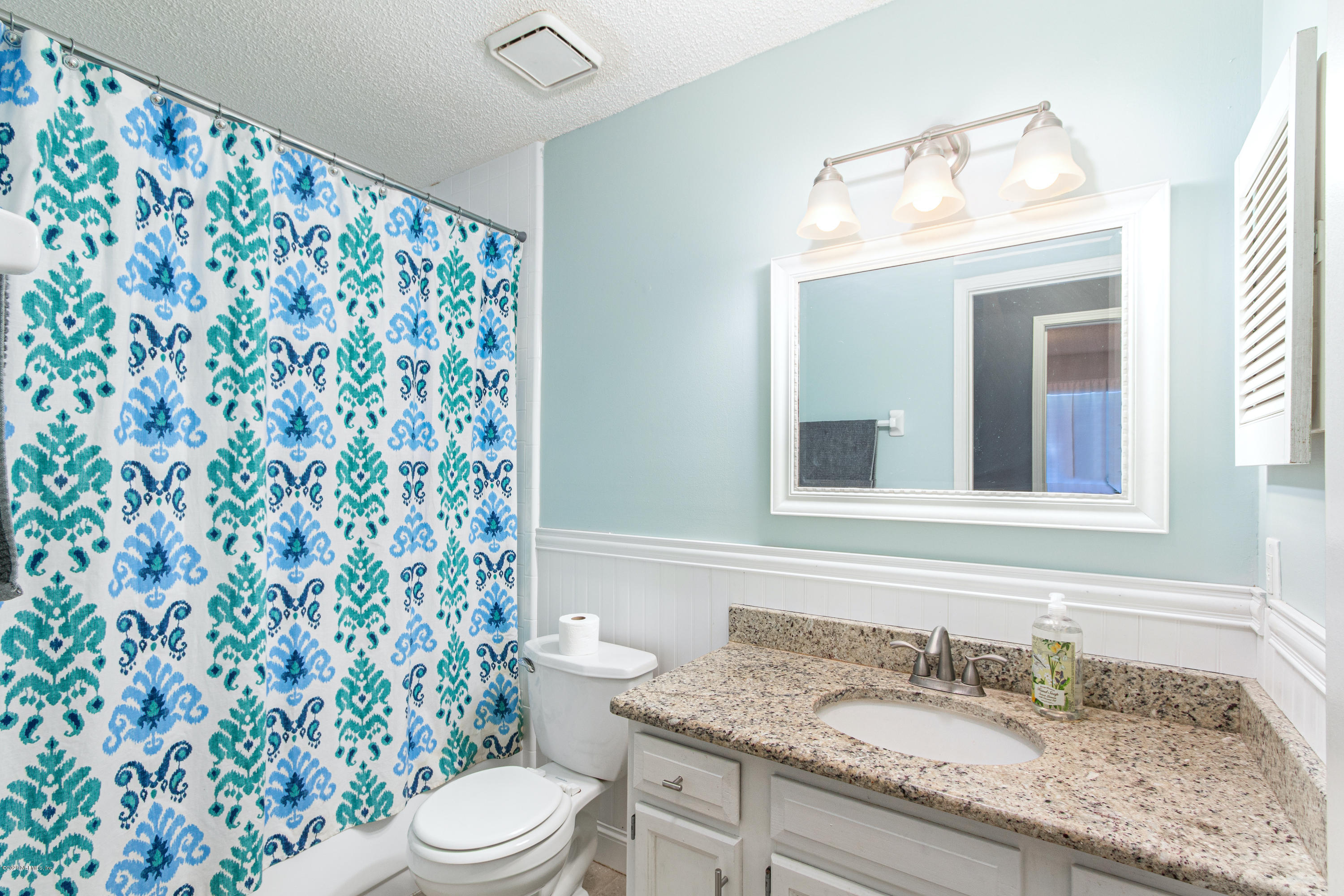 1214 Raleigh Ridge Drive Jacksonville, FL 32225 - Photo 17 of 25 a bathroom with a granite countertop sink and a mirror