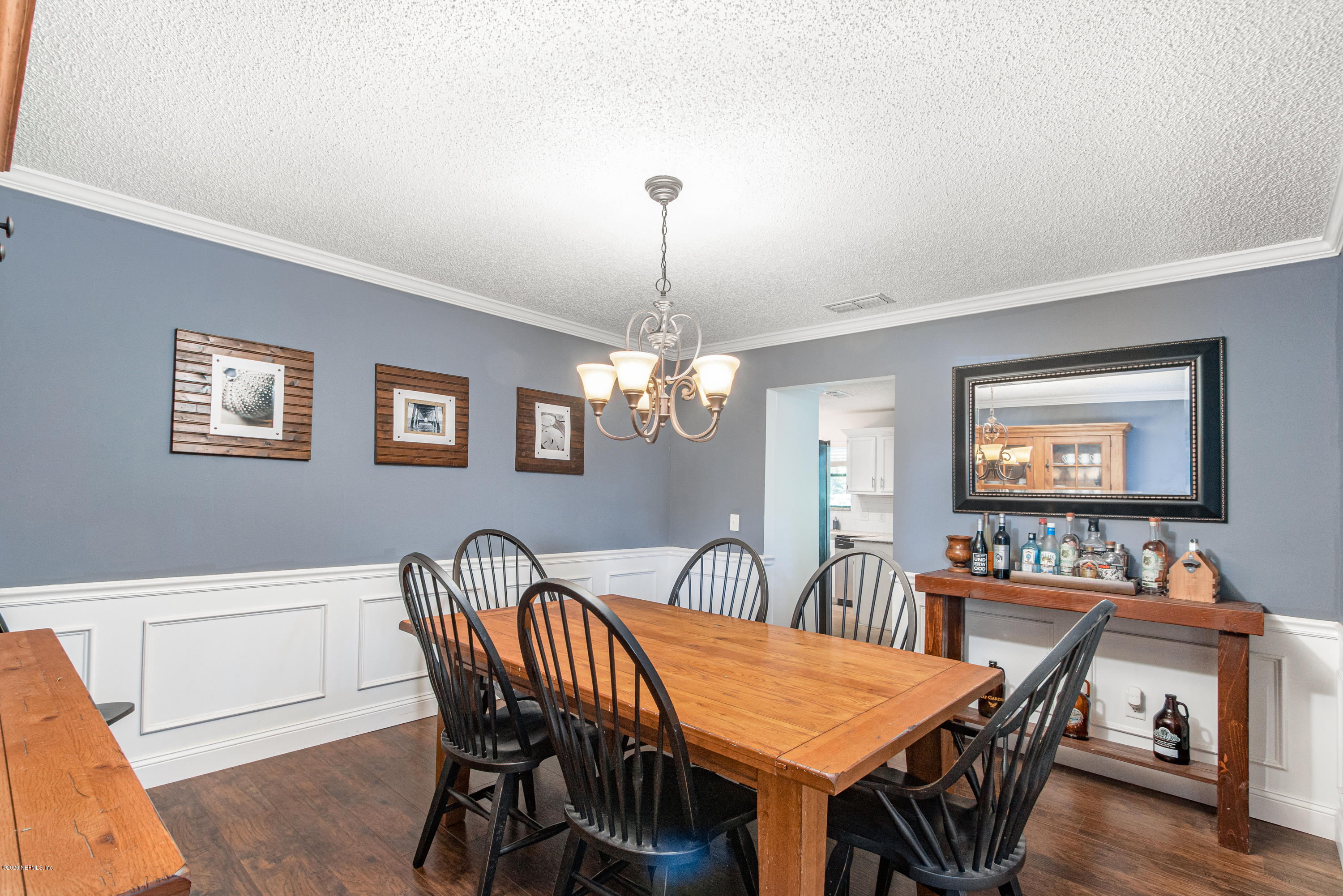 1214 Raleigh Ridge Drive Jacksonville, FL 32225 - Photo 19 of 25 a view of a dining room with furniture window and wooden floor
