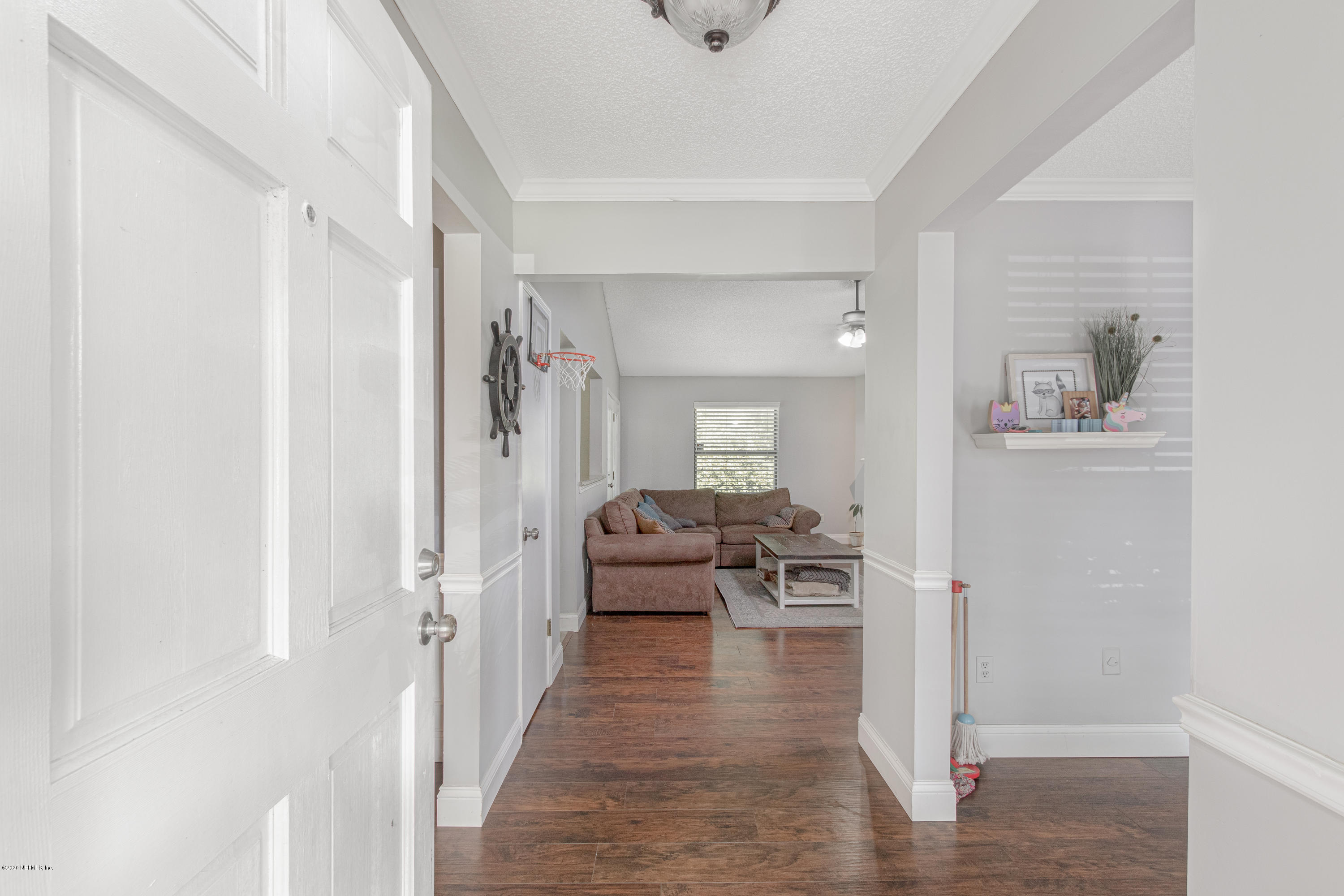 1214 Raleigh Ridge Drive Jacksonville, FL 32225 - Photo 2 of 25 a view of a livingroom with furniture and wooden floor