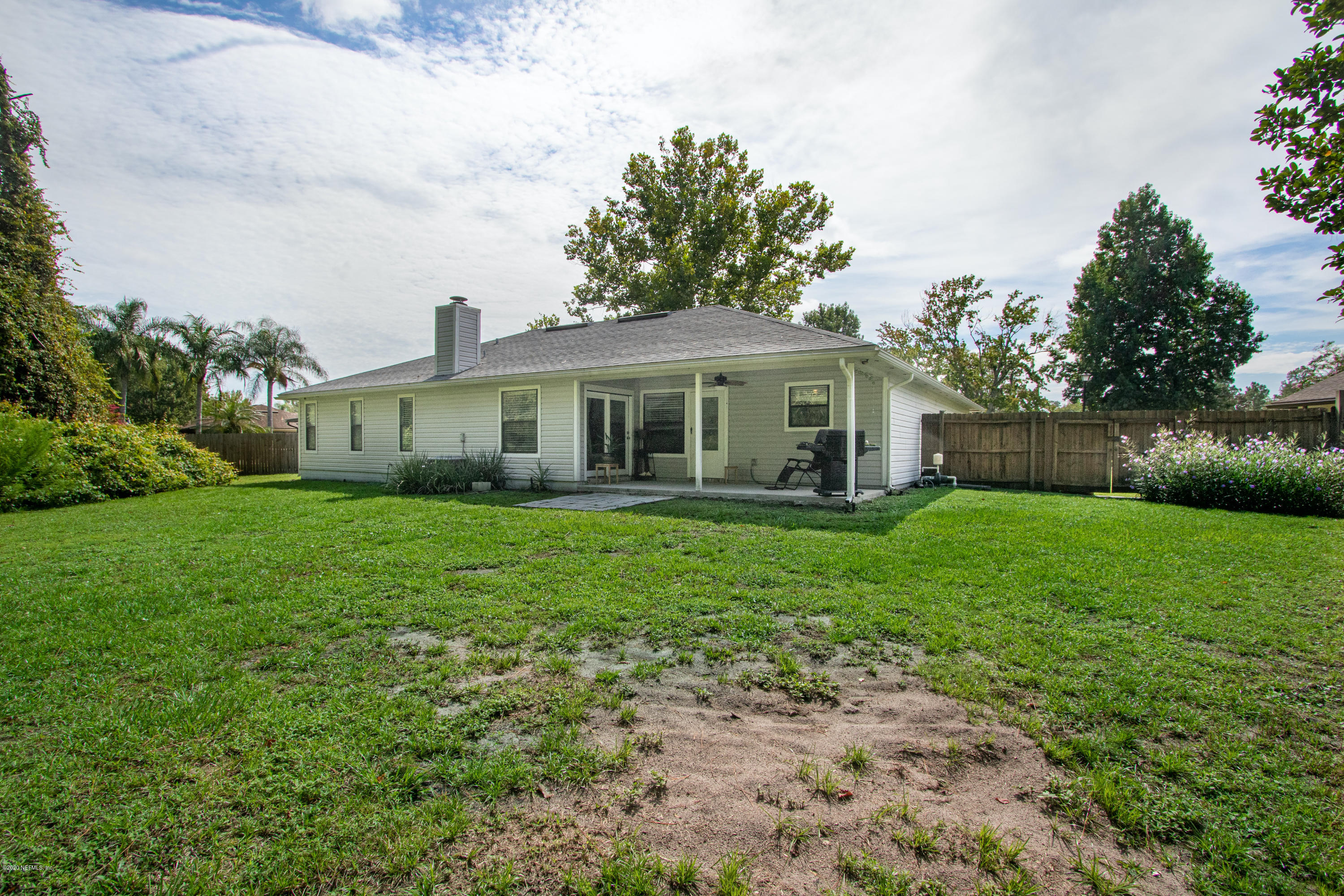 1214 Raleigh Ridge Drive Jacksonville, FL 32225 - Photo 23 of 25 a front view of house with yard and green space