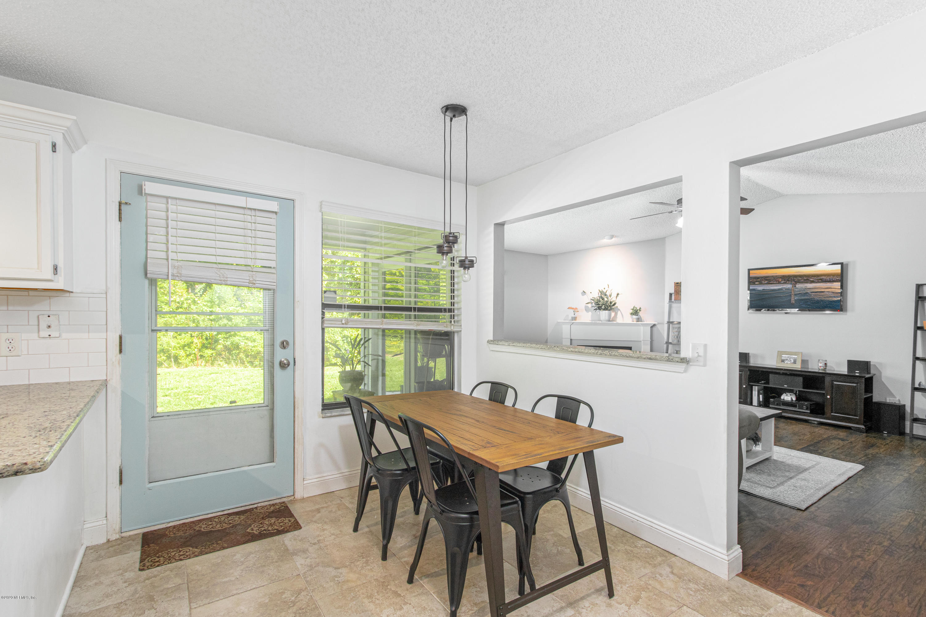 1214 Raleigh Ridge Drive Jacksonville, FL 32225 - Photo 7 of 25 a view of a dining room with furniture window and outside view
