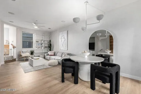 a view of a livingroom with furniture and window