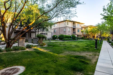 a view of a big yard next to a house