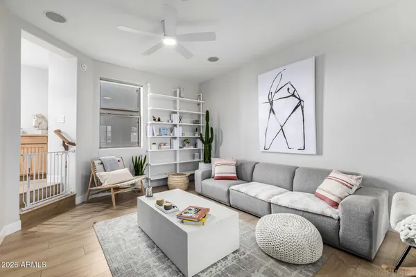 a living room with furniture or couch and a table