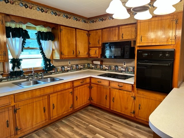 3950 Viola Road McMinnville, TN 37110 - Photo 13 of 26 a kitchen with stainless steel appliances granite countertop a sink and cabinets