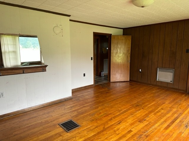 3950 Viola Road McMinnville, TN 37110 - Photo 6 of 26 a view of an empty room with wooden floor and a window