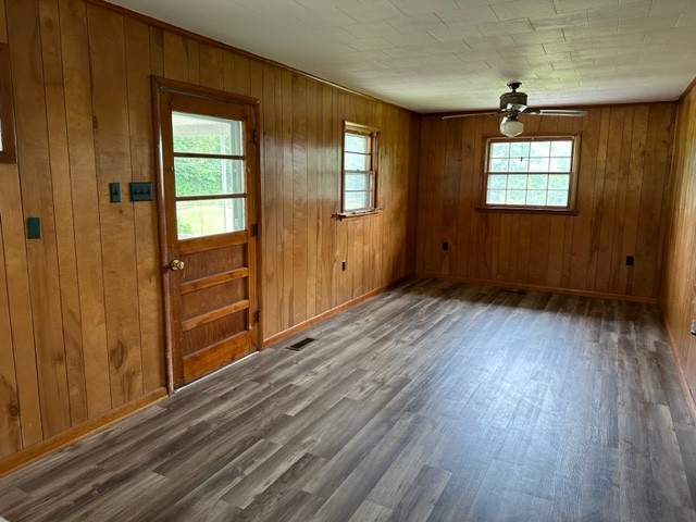 3950 Viola Road McMinnville, TN 37110 - Photo 9 of 26 an empty room with wooden floor windows and entrance