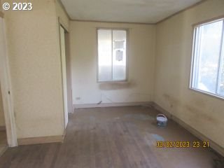 15030 Northwest Cornelius Pass Road Portland, OR 97231 - Photo 6 of 16 an empty room with a window