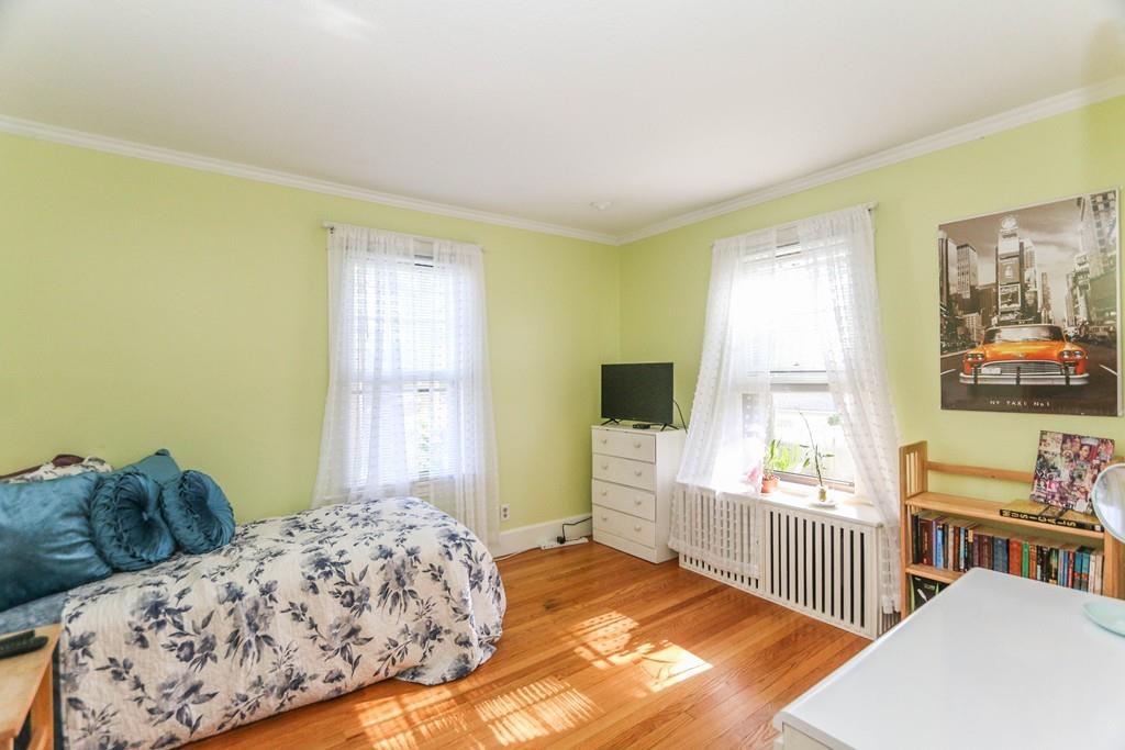 14 Rencelau Street Springfield, MA 01118 - Photo 22 of 35 a bedroom with two beds and a window