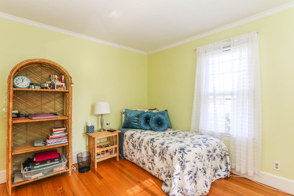 14 Rencelau Street Springfield, MA 01118 - Photo 23 of 35 a bedroom with a bed and a window