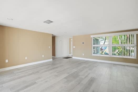 12612 4th Isle Hudson, FL 34667 - Photo 10 of 50 a view of an empty room with a window