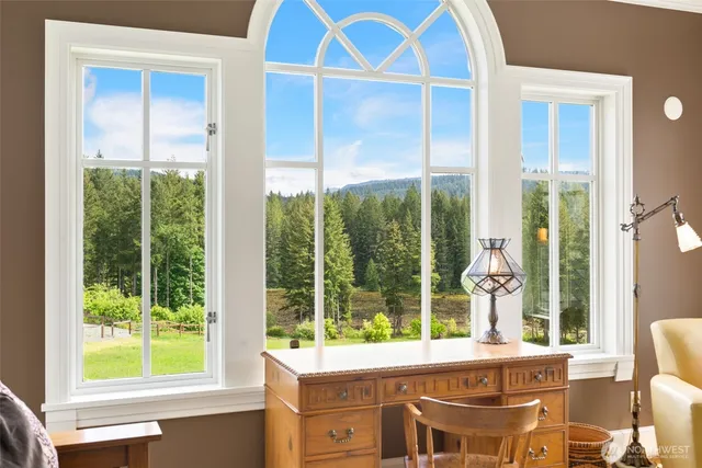 a view of a outdoor space with furniture and garden