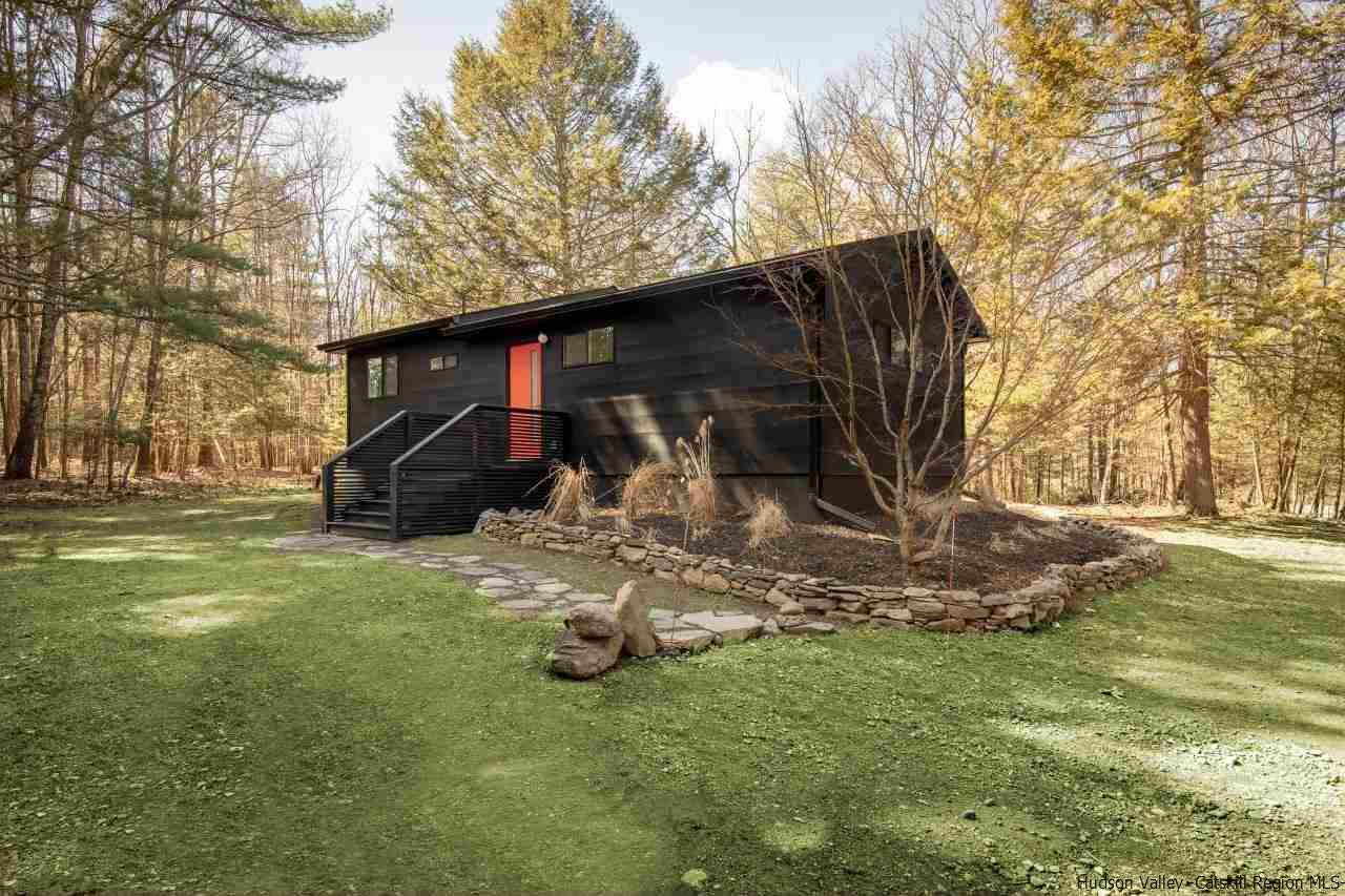 25 Upper Cherrytown Road Kerhonkson, NY 12446 - Photo 1 of 14 a front view of a house with garden