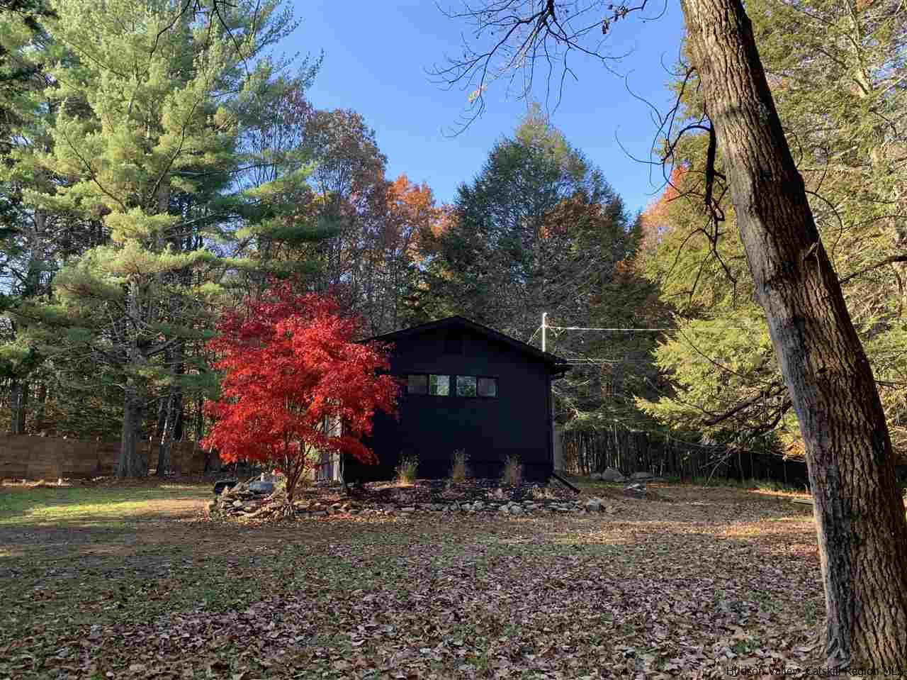 25 Upper Cherrytown Road Kerhonkson, NY 12446 - Photo 14 of 14 a front view of a house with garden