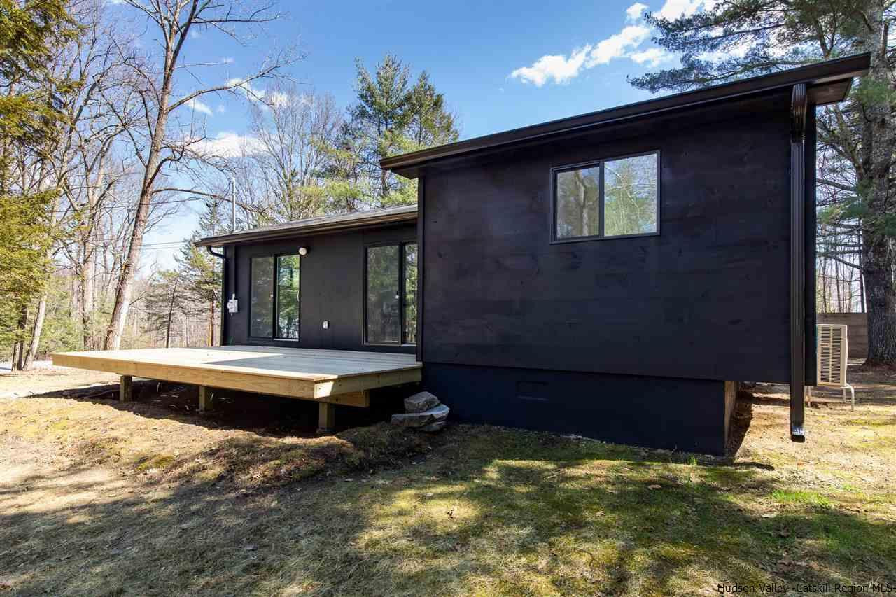 25 Upper Cherrytown Road Kerhonkson, NY 12446 - Photo 2 of 14 a view of swimming pool with outdoor seating