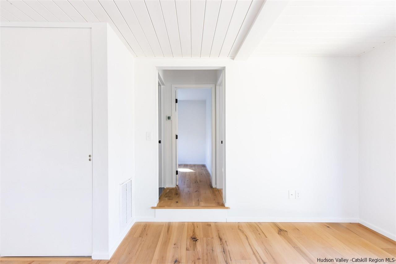 25 Upper Cherrytown Road Kerhonkson, NY 12446 - Photo 6 of 14 a view of hallway with wooden floor