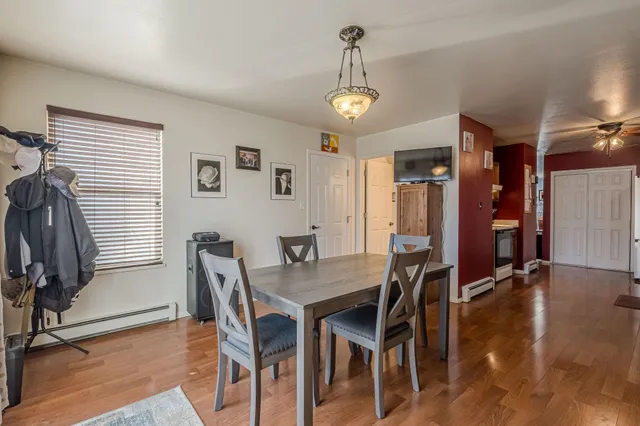 a view of a dining room with furniture
