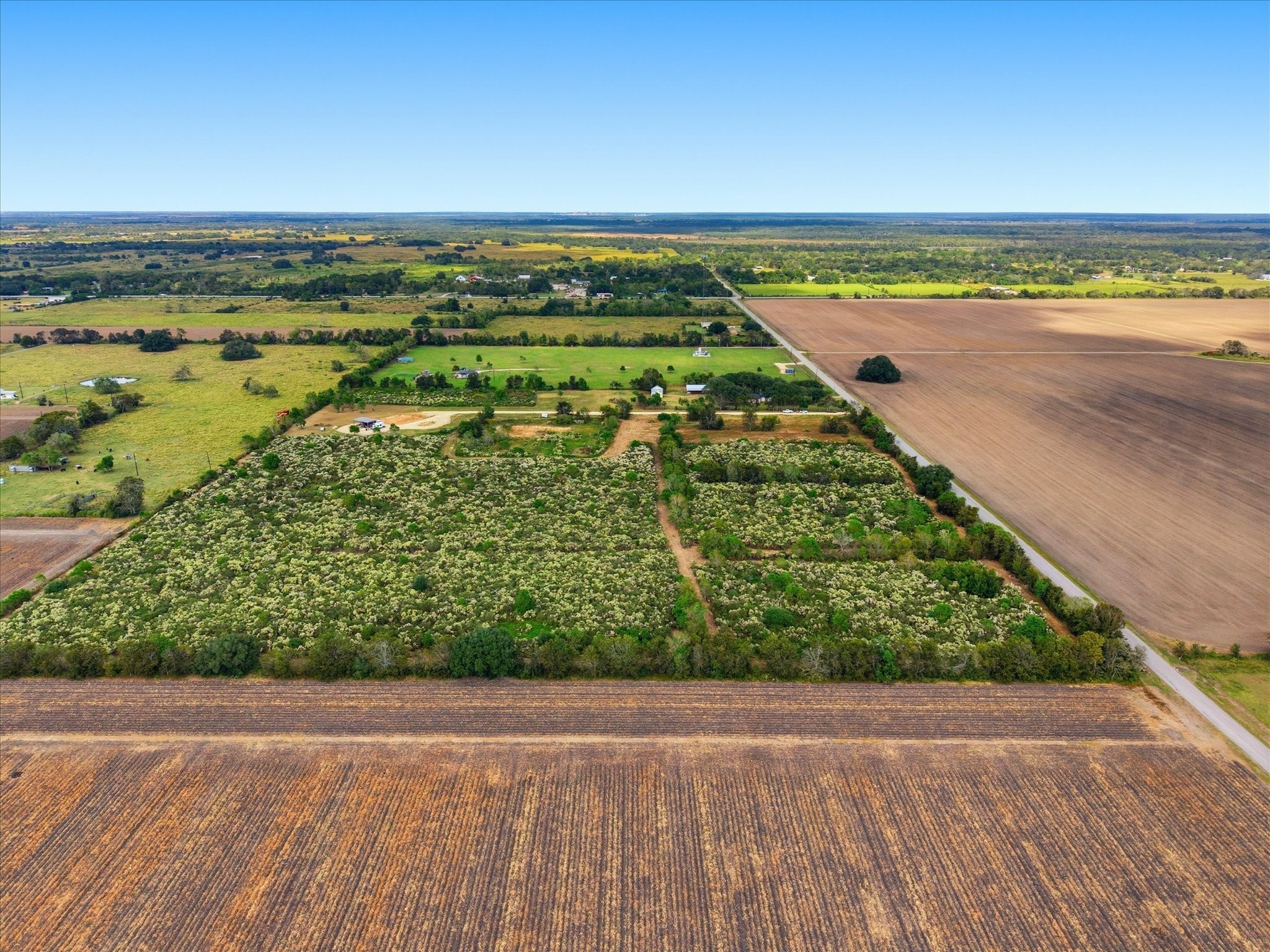 Lot 9 Cow Creek Road Damon, TX 77430 - Photo 6 of 12 a view of a city and an ocean view