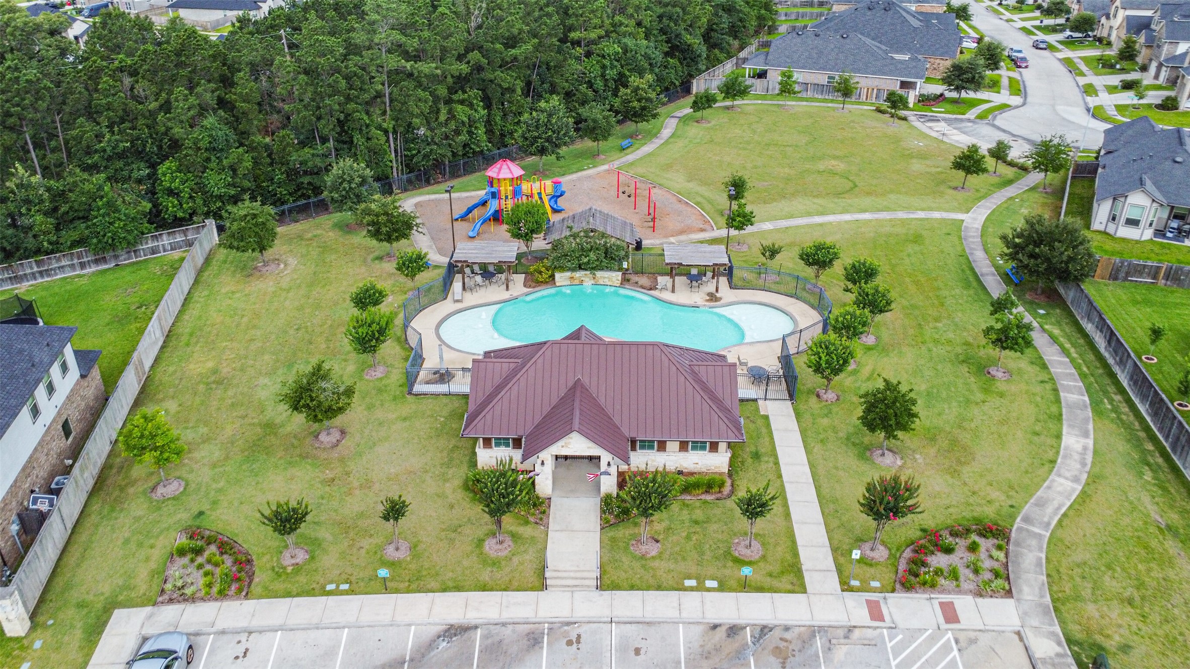 218 Springfield Terrace Drive Conroe, TX 77304 - Photo 36 of 39 Community pool and park.