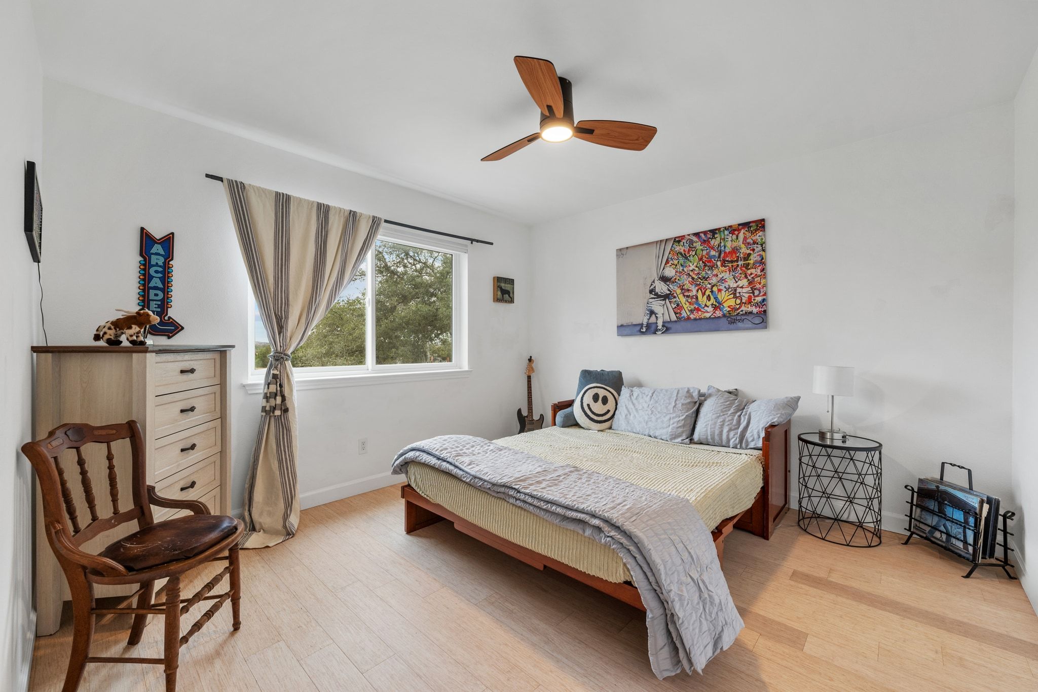 401 Ranchview Drive Johnson City, TX 78636 - Photo 24 of 40 Bedroom with a ceiling fan and light wood-style floors